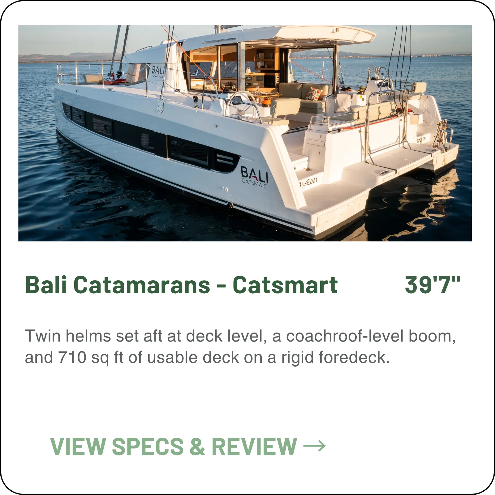 Twin helms set aft at deck level, a coachroof-level boom, and 710 sq ft of usable deck on a rigid foredeck.